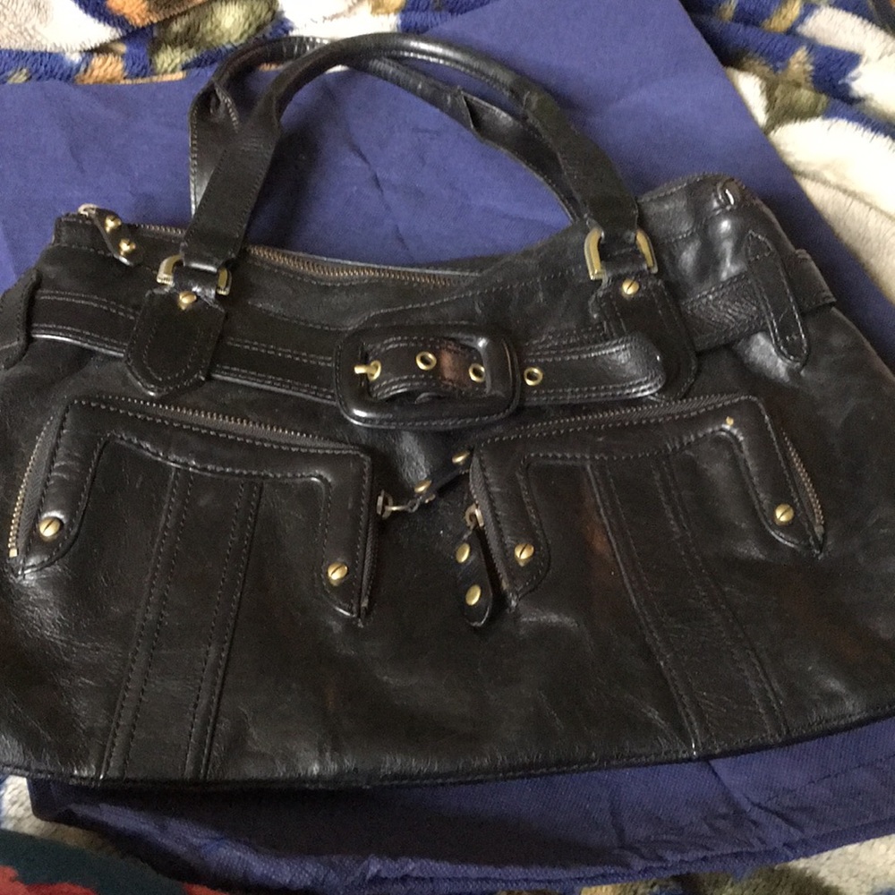 A large COLE HAAN